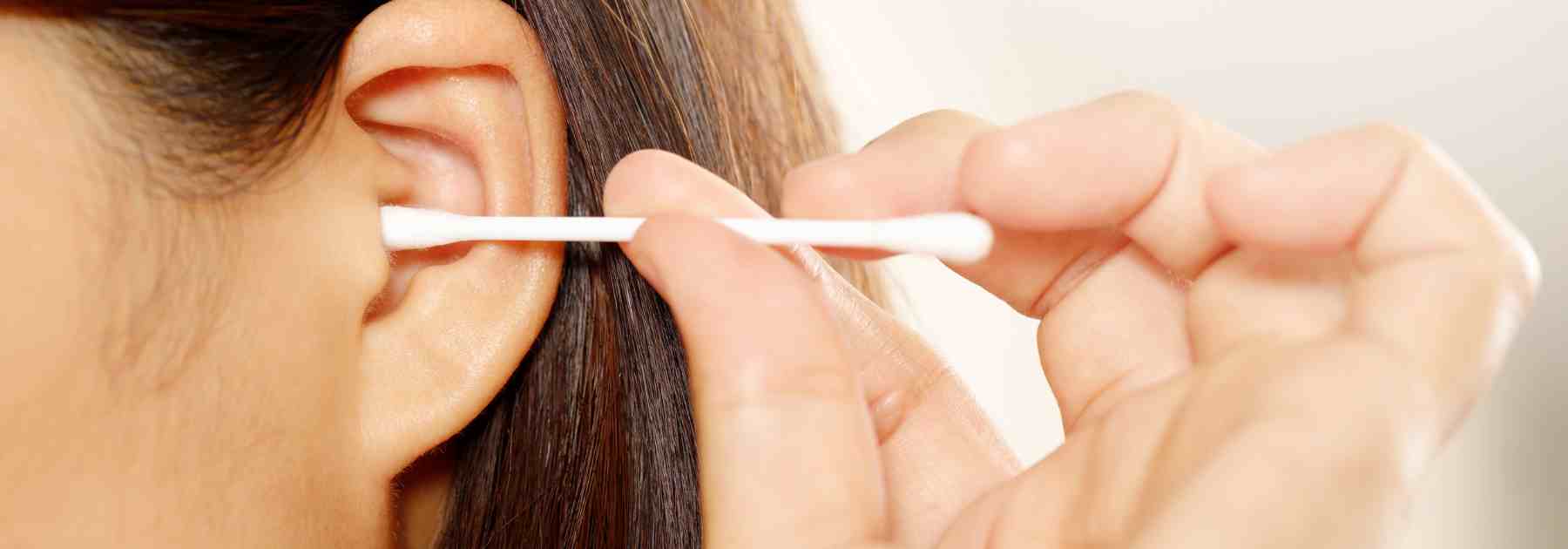 How to open a blocked ear at home vs professional wax removal