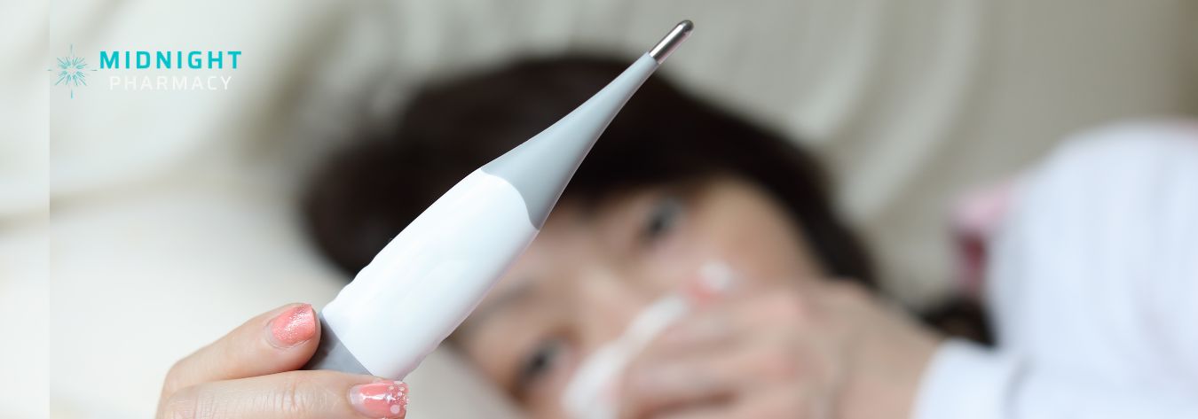 Woman holding a thermometer 