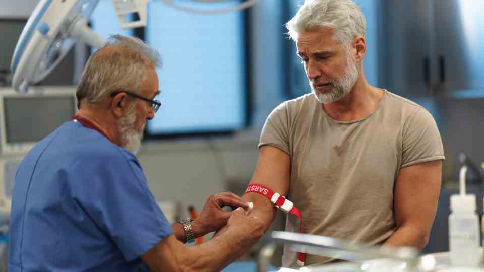 Man getting his blood tested at a private clinic in Bradford