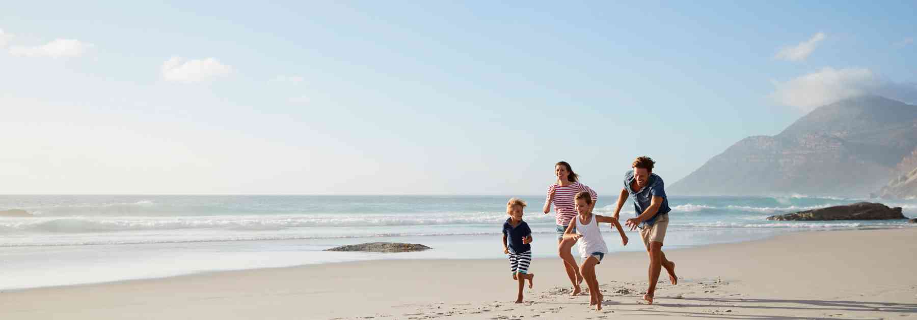 Family enjoying beach vacation