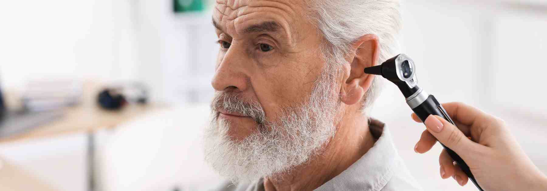 Man getting an ear check.